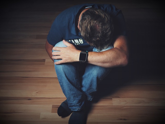 Chronic Pain and the epidemic of unsolicited advice. Person curled up in pain.